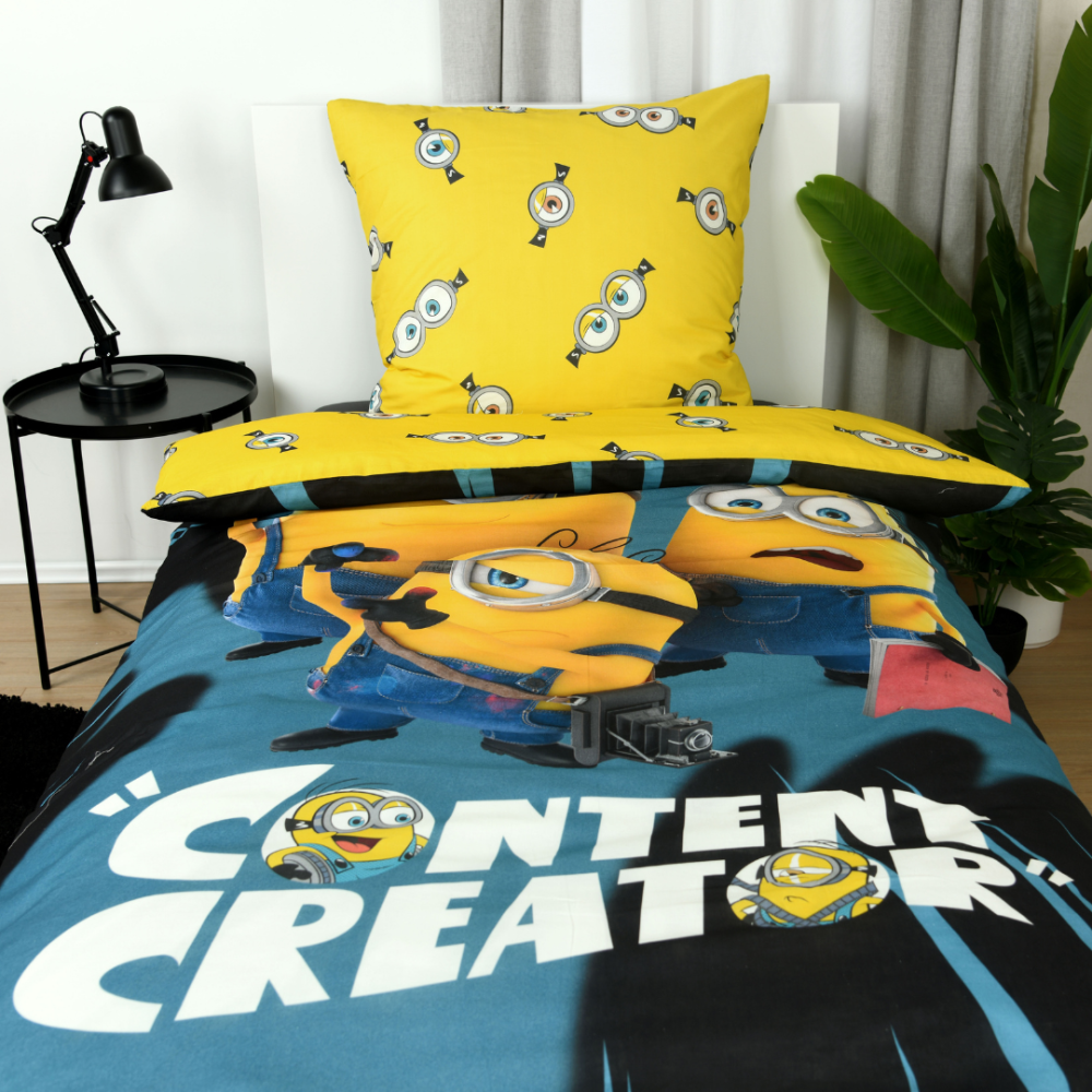 Gultas veļas komplekts „Minions“. Kokvilnas gultas veļa, 135x200 cm. Dzeltens gultas veļas raksts ar atkārtotiem minionu acu motīviem Gultas veļas komplekts „Minions“. Kokvilnas gultas veļa, 135x200 cm. Dzeltens gultas veļas raksts ar atkārtotiem minionu acu motīviem