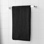 Vannas dvielis „Obsidian Softness“. Dvieļi, 70x140 cm. Elegants melns vannas dvielis, kas piešķir modernitāti un greznību jūsu vannas istabai.